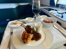 Lamb roast. Executed well for airplane food but not enough jus. 8/10
