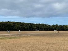 A plane landed and took of from the landing strip.  