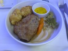 Beef. In the oven a few minutes too long, but would order again. 