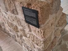 Part of the original wall runs through the lobby.
