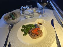 I rarely have beef on the plane so tried it for a change and it was good. Tender and a tasty jus. The veg were average. 