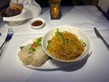 Wok-fried soya noodles with seafood wantons