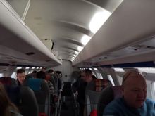 The small cabin has 11 rows of seats in a 2-1 configuration.