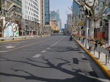 This a picture of Nanjing Rd. facing east towards Jing'an Temple, which you can see on the left side of the street if you look hard enough (it is gold).  I amazed that there weren't any cars at all.  (It is one of the busiest streets in Shanghai.)