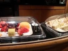assorted fruit and finger sandwiches -- I didn't try any but looked like egg salad, cheese (I think literally just cheese), cucumber-tomato