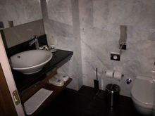 Bathroom just at entry to suite (walk in shower, no tub)