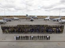 The Australian Defence Force released a group photograph of all the air crews and officials who took part in the aerial search for MH370.