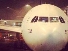 Admiring a SAS plane at Stockholm Arlanda before boarding another flight to London.