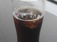 United glass, jack and coke, in IFL at NRT