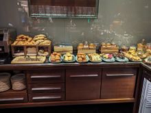 Donuts, muffins, croissants, and other pastries.