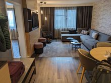 Club Suite room, taken from hall entry door. Small quarter bath is on the right. 
