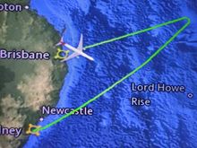 The longest Friday of my life became significantly shorter with diversion to BNE plus 4 hours of flying in circles still making Friday a very long day. A backup flight system had failed and due to the aircraft not having the ability to dump fuel, and SYD having a curfew, we went to the nearest airport with a Qantas maintenance facility.