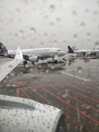 Departure from BRU, under the rain...