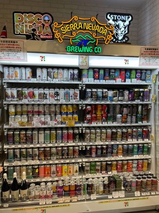 Part of the beer selection in the 7-11 in the building 