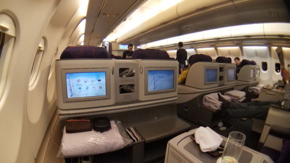 View from seat 14A - points for anyone who can guess which airline the amenity kit is from
