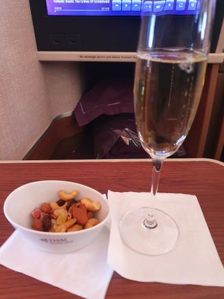 After take-off, got another glass of champagne to go with the mixed nuts.