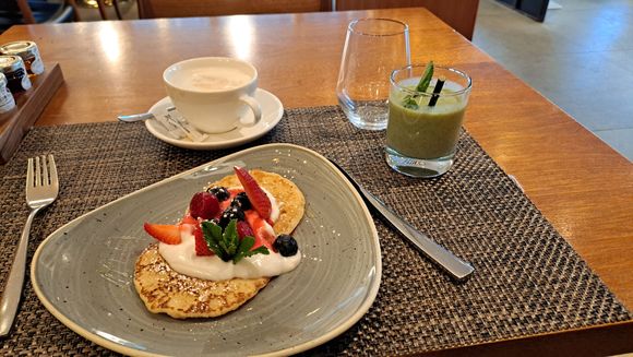 The cathay pacific  f lounge pancakes and a cathay delight