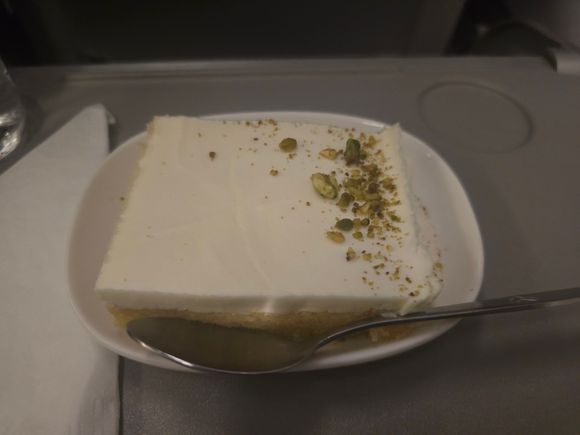 Dessert was served separately and it was a very tasty - revani with masticha cream and grated pistachio