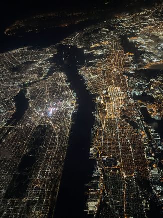 Flying over the Hudson River; New Jersey to the right, Manhattan and Brooklyn to the left, and Staten Island at the top.
