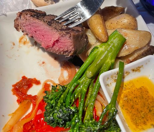This is the only time I have ever had a steak cooked perfectly on an airplane. 