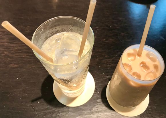 Iced water and one of the iced lattes 