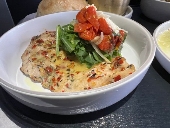 Chicken paillard - fennel, cherry tomatoes, arugula, lemon vinaigrette.  Pretty good, I ended up putting everything inside the bread to make a sandwich.