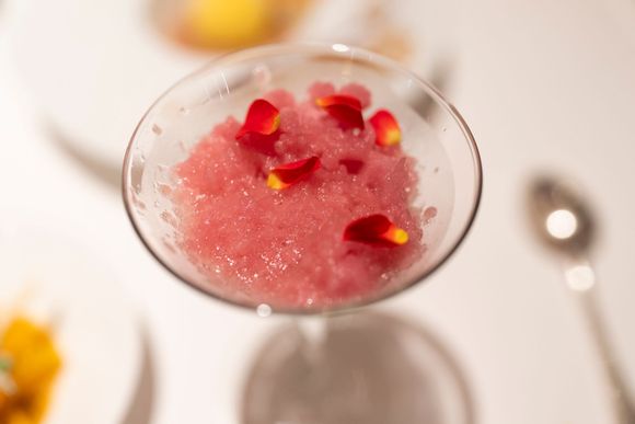 Strawberry ice topped with champagne