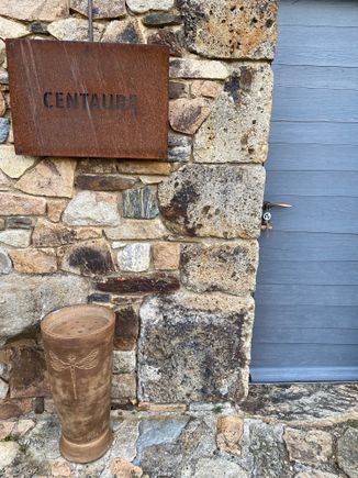 Up some stairs to the main entrance to our cottage, the Centaure, at the Domaine des Etangs.