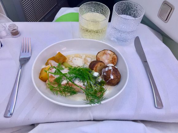 Main course of salmon with potatoes. Salmon tasted ok, potatoes not so much. Presentation was above the Finnair average, maybe the dill garnish made the trick.