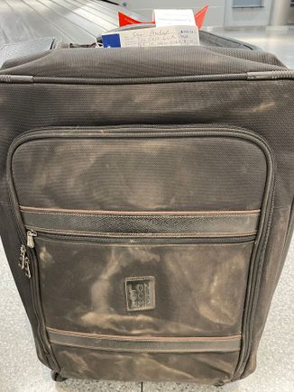 Condition of second suitcase on arrival in New York
