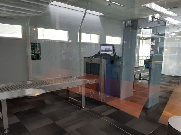 5. Somebody will come along and let you through into the screening room. You will need to show your onward boarding card and go through standard security, even though it will be just you and one security person.
