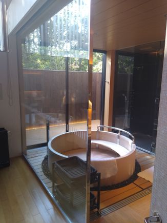 View of part of the master bathroom from the bedroom. There is also a guest toilet adjacent to the living room.