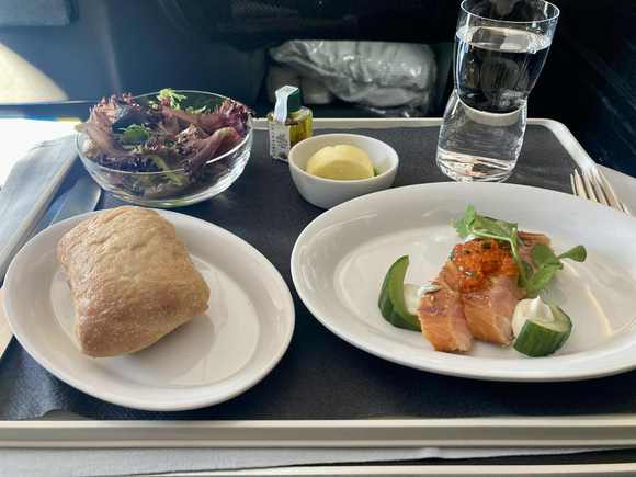 Appetizer: greens, bread with parsley butter, smoked salmon with trout roe and cucumbers