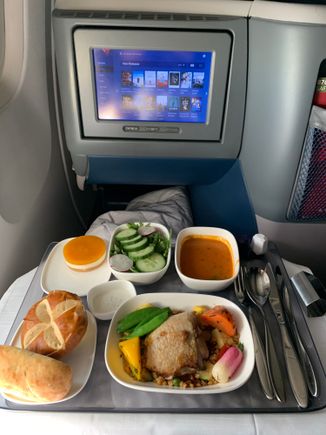 TATL D1 lunch all on one tray- choice of 3 main entrees, tomato soup, salad, mango mousse cake dessert and warm breads. Also offering one red (French Pinot Noir) and one white. 