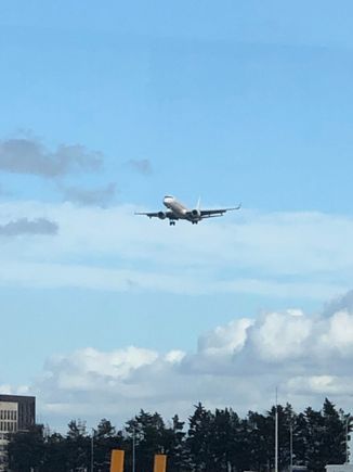 A flight is landing so the airport may be open. 