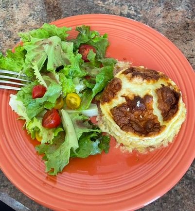 One of yesterday’s ham and gruyere soufflés nuked, with a salad for lunch today. 