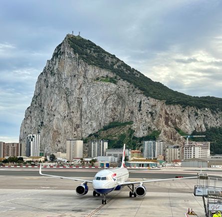 The jet arrives, as seen from the balcony outside the Calpe Lounge.