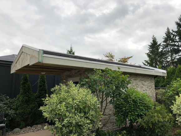 Concrete tile roof with hidden gutters