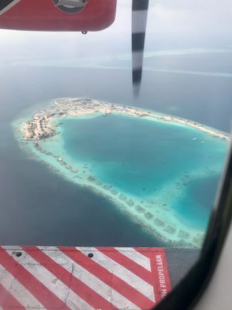 Man made island and some water villas and their foundations perhaps?