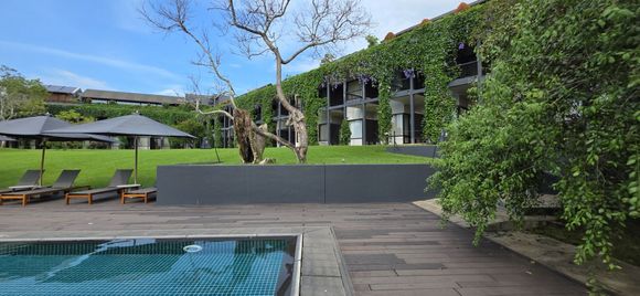 View of the pool towards the hotel, and you can see how close the ground floor rooms are