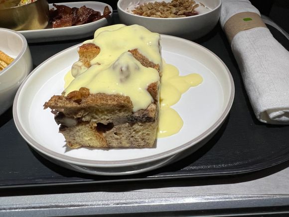 Banana bread pudding - crème anglaise.  Tasty, wasn’t too sweet.

