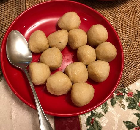 Fish balls , the slightly larger ones have bits of chilli and onions