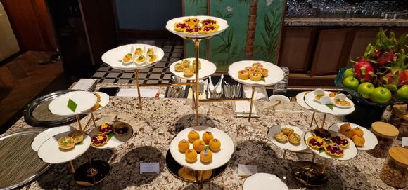 Evening buffet spread. 5-6 items a night, similar to what they used to bring to the table. I'm not a huge fan of this setup and think some of this ought to be refrigerated rather than sitting out for hours (e.g., ceviche).