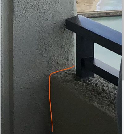 Gap between building and deck wall