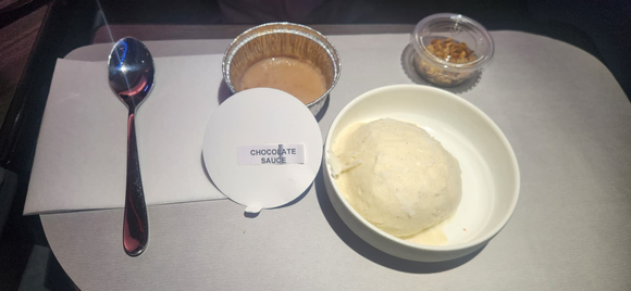 Vanilla gelato with milk chocolate sauce (which was not very sweet and I almost used the entire thing!) and "cacao nib crumble" (which was really just granola and I did not have more than just a taste)
