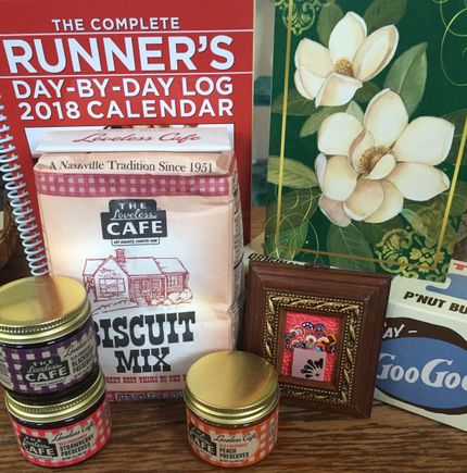 I can never wait to open my presents. Received these awesome gifts from aquamarinesteph yesterday. It's so, hard to get good biscuits out West, I can't wait to make these. I've actually been to the Loveless Cafe so, I was particularly excited to see these. And the running journal, I hope will keep me on task. The framed art is from Sicily. I love local art stuff. And sweets! Super happy with my gift 