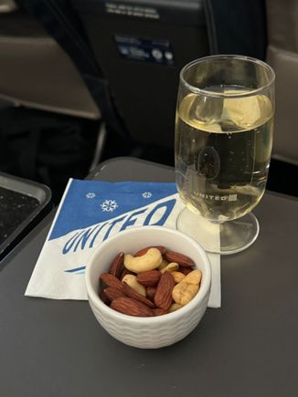 Who doesn't love warm nuts and sparking wine?