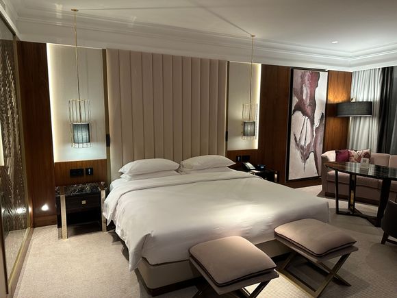 The bedroom has a king-size bed.