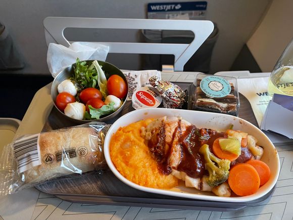Westjet 2207 Cancun to Edmonton 26 February 2022. Premium Cabin. BBQ Chicken
