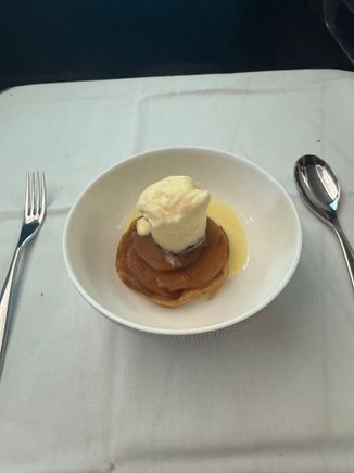 The Tarte Tatin was quite tough, but well worth the effort to break it apart. The ice cream always nice on a plane in my view (looking at you American!)